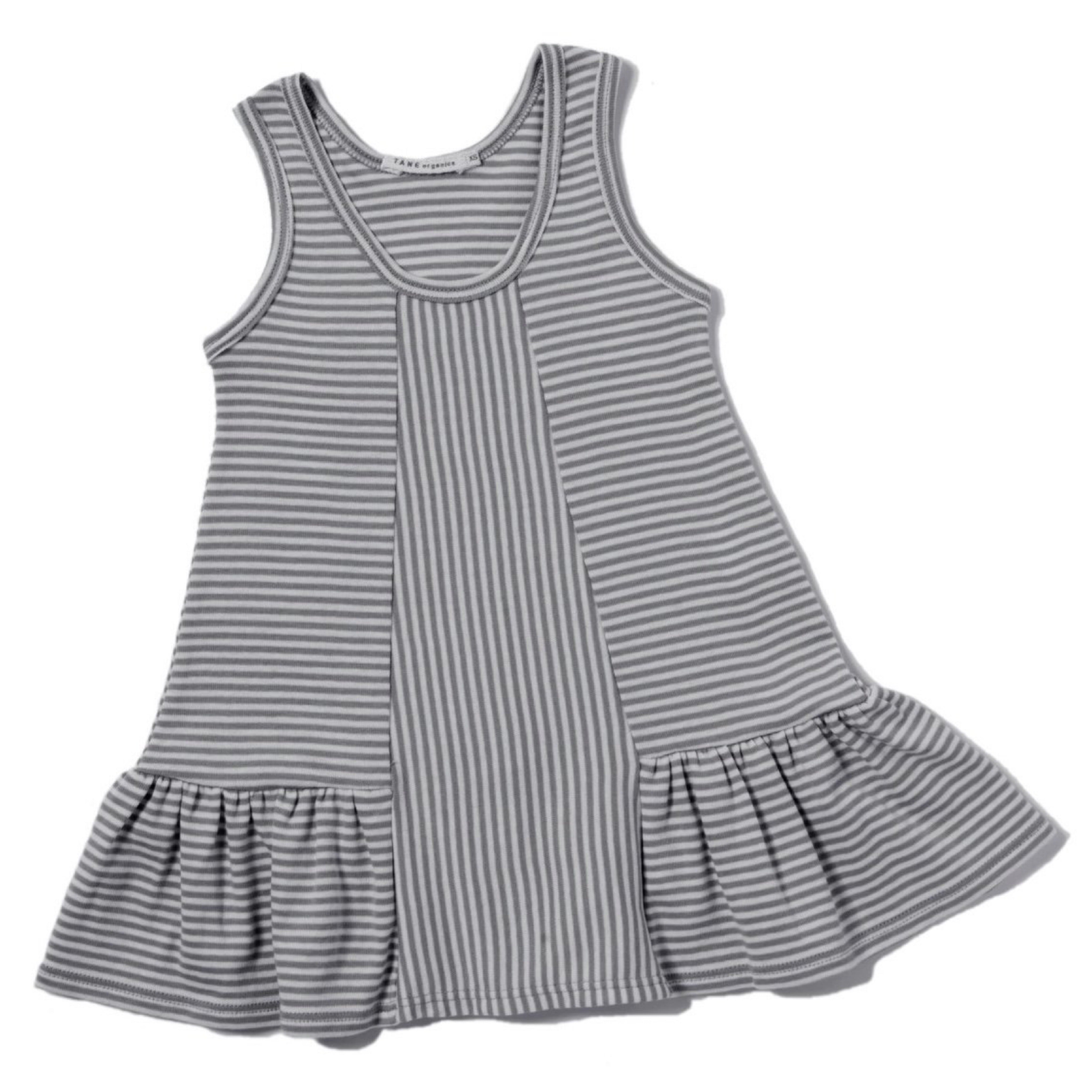 cool grey and cream color petite stripes sleeveless tank dress with ruffles at hem. Direction play at the center front panel. 100% organic cotton petite stripe knit.