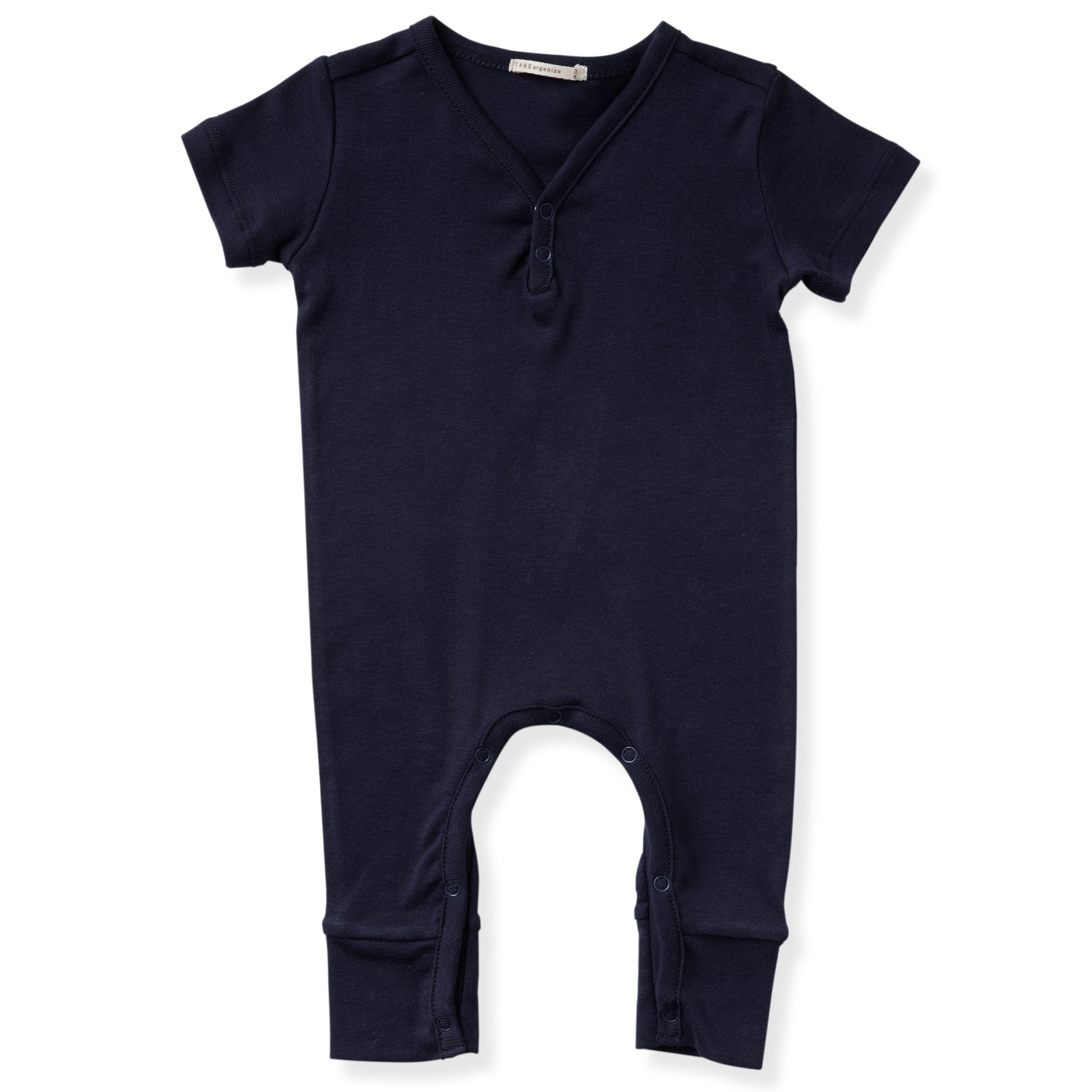 navy short sleeved v-neck coverall with 2 buttons and elongated legs. 100% organic pima cotton ribbed knit.